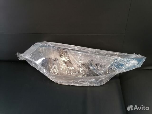 Стекло фары optima