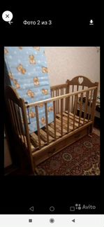 Детская кроватка с маятником и ящиком