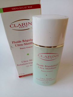 Матирующий флюид для лица Clarins