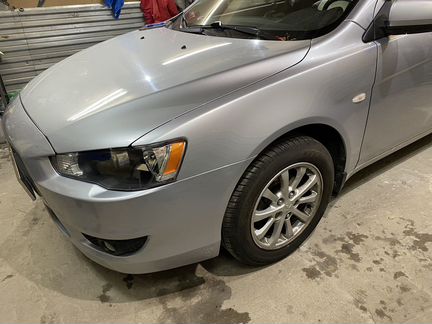 Mitsubishi Lancer 10 крыло Переднее левое