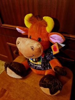 Игрушка плюшевая музыкальная Бычок